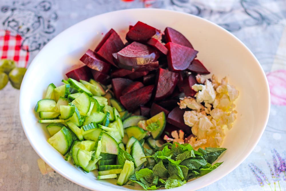 making cucumber and beetroot salad