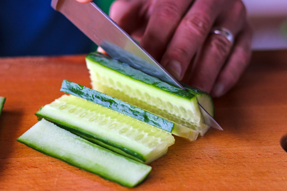 cut cucumber into thin slices