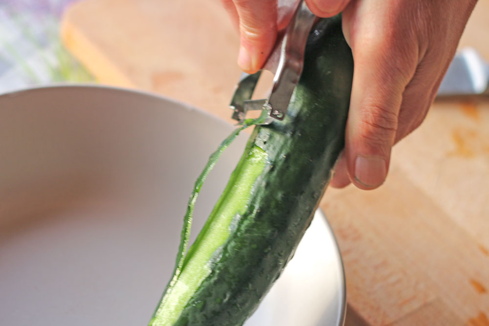 peel the cucumber with a vegetable peeler