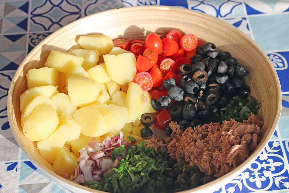 make tuna potato salad by mixing ingredients
